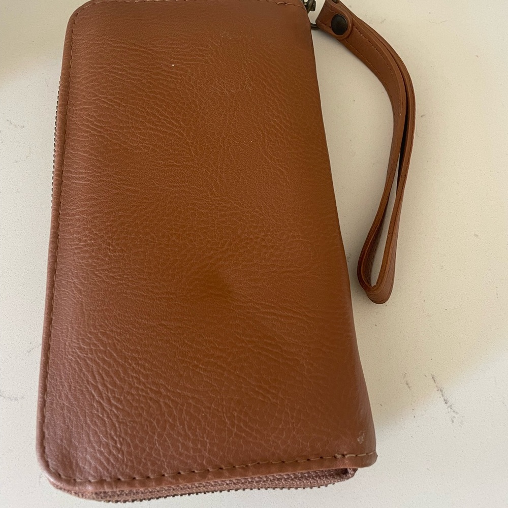 Lightly used cowhide and leather wallet
